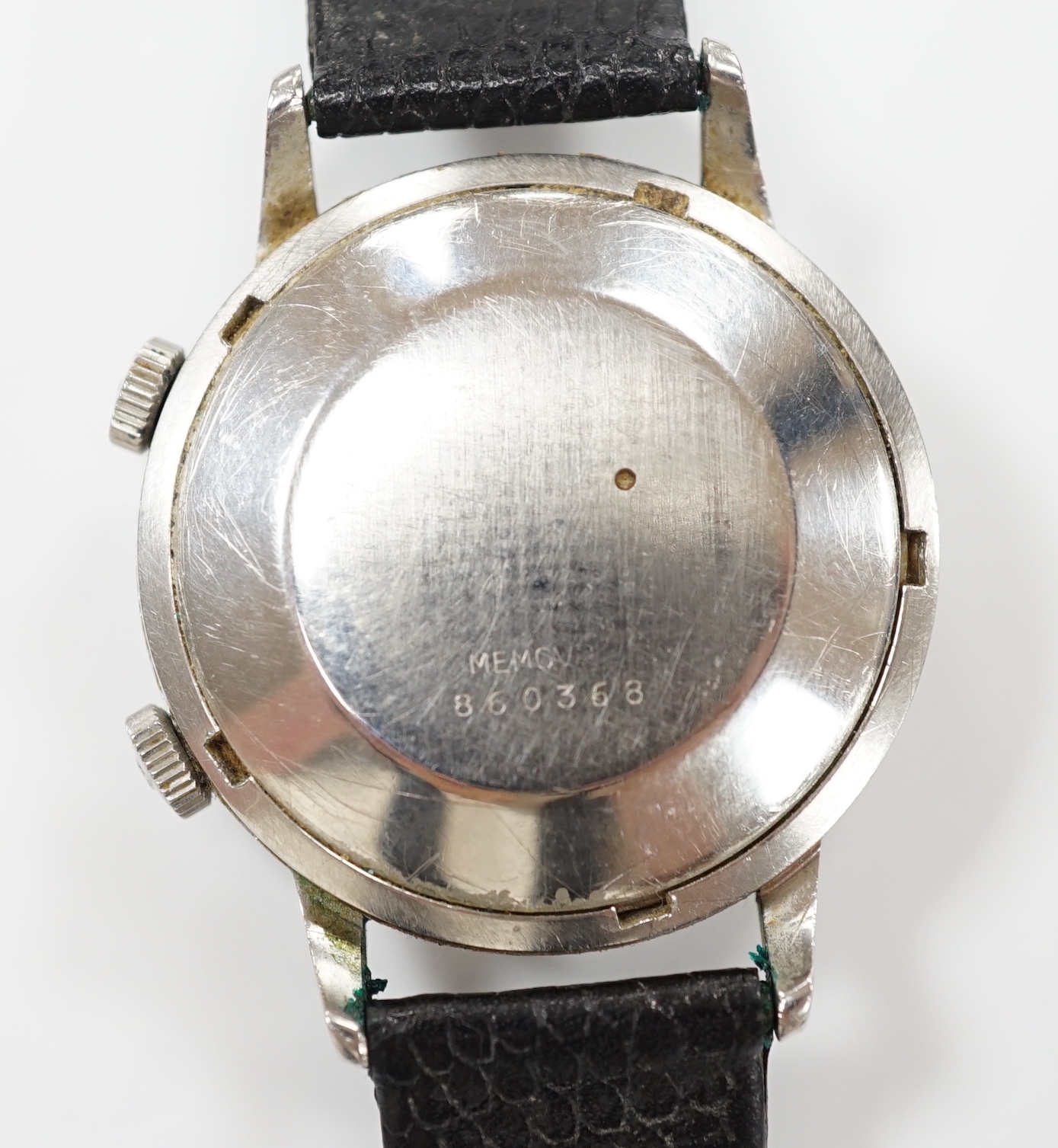 A gentleman's stainless steel Jaeger LeCoultre Memovox automatic 'oversize' wrist watch, with baton numerals and date aperture, case diameter 37mm, case back numbered 860368 on associated leather strap, no box or papers.